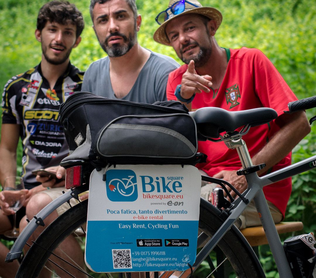 Colleagues during a break with an electric bike